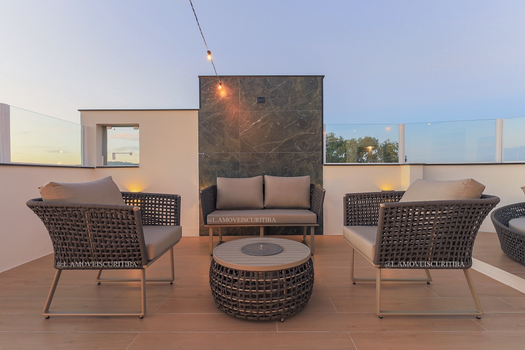 Lounge externo com móveis produzidos sob medida